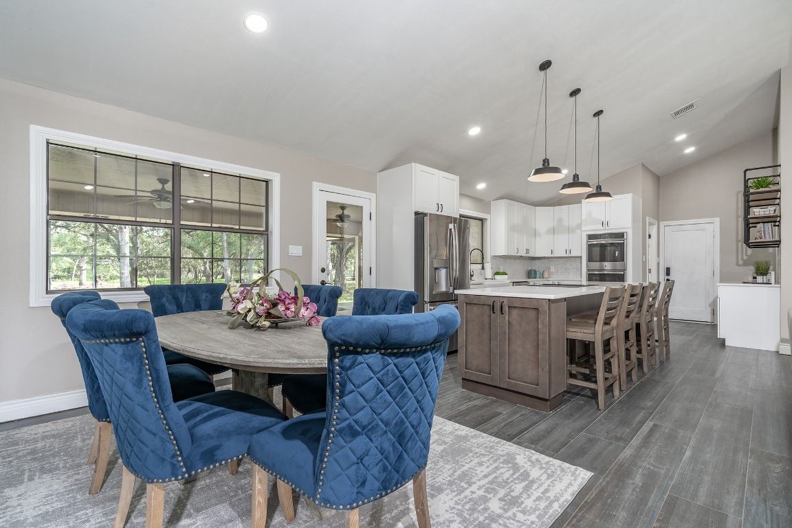Dining room, Interior, Kitchen, Pendant Lights, Recessed Lighting, Stainless Steel Appliances, Wood Texture Flooring