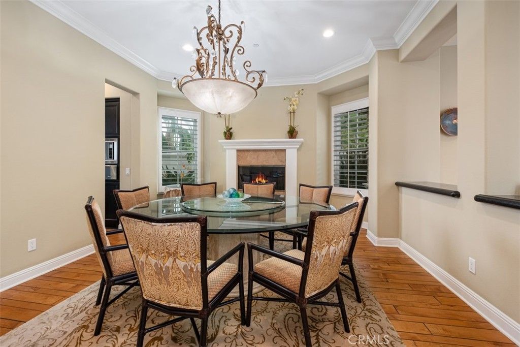Dining room, Fireplace, Interior, Pendant Lights, Recessed Lighting, Wood Texture Flooring