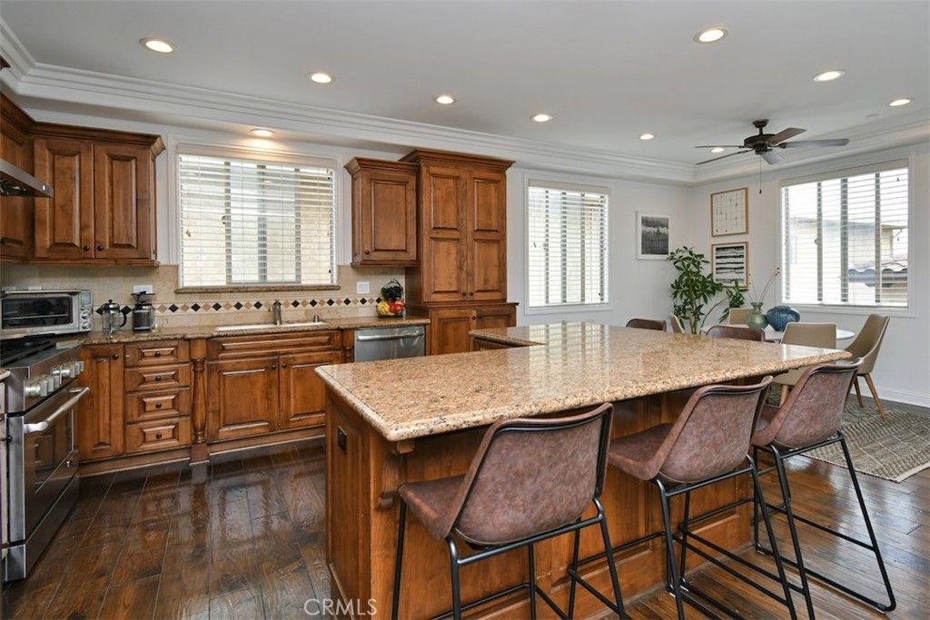 Dining room, Interior, Kitchen, Recessed Lighting, Stainless Steel Appliances, Wood Texture Flooring