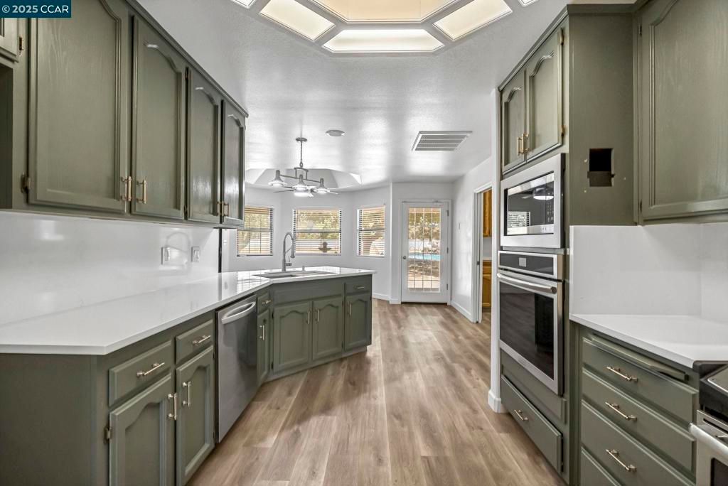 Chandelier, Interior, Kitchen, Stainless Steel Appliances, Wood Texture Flooring