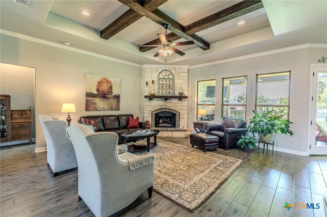 Fireplace, Interior, Living room, Recessed Lighting, Stone Walls, Wooden Beams, Wood Texture Flooring