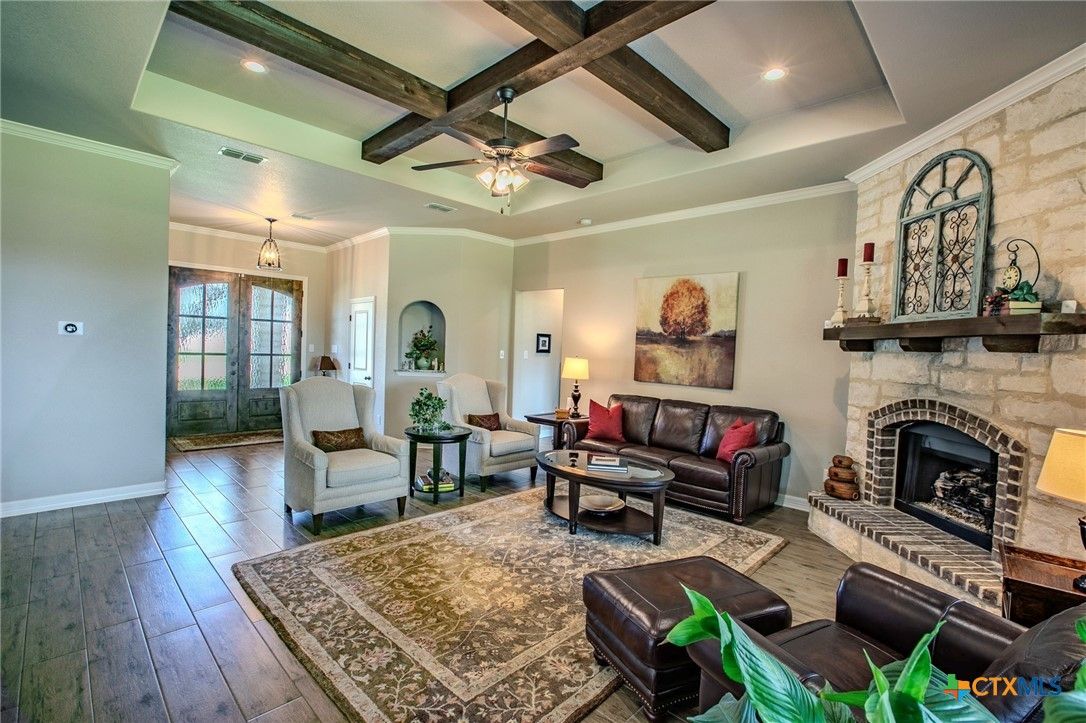 Fireplace, Interior, Living room, Pendant Lights, Recessed Lighting, Stone Walls, Wooden Beams, Wood Texture Flooring