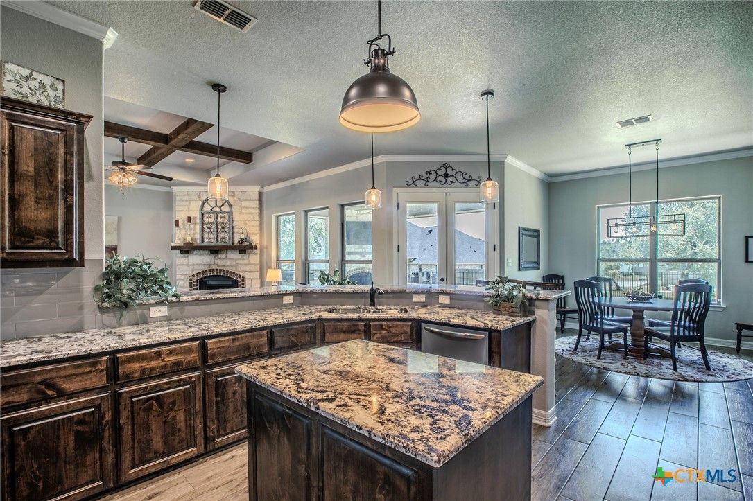 Dining room, Fireplace, Interior, Pendant Lights, Wood Texture Flooring
