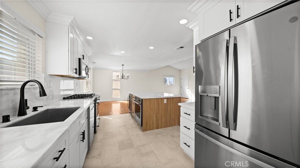 Chandelier, Interior, Kitchen, Pendant Lights, Recessed Lighting, Stainless Steel Appliances, Wood Texture Flooring