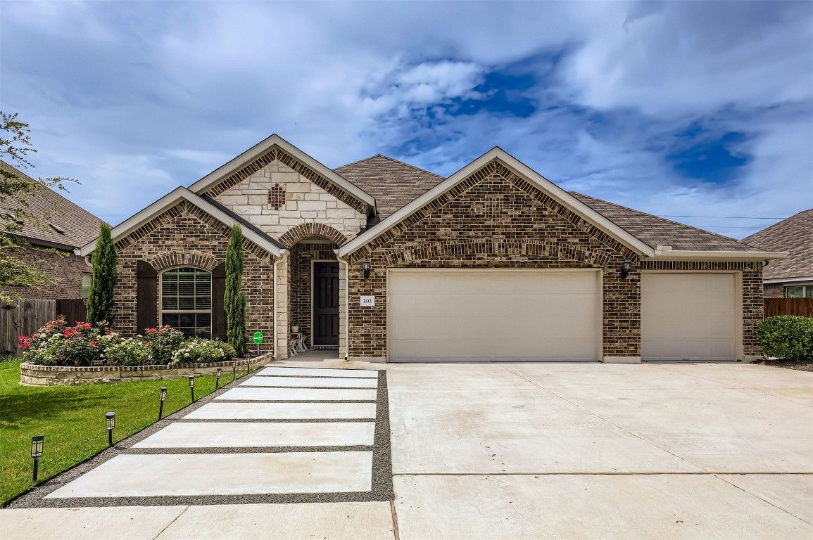 Attached, Exterior, Facade, Brick Facade, Brick Traditional