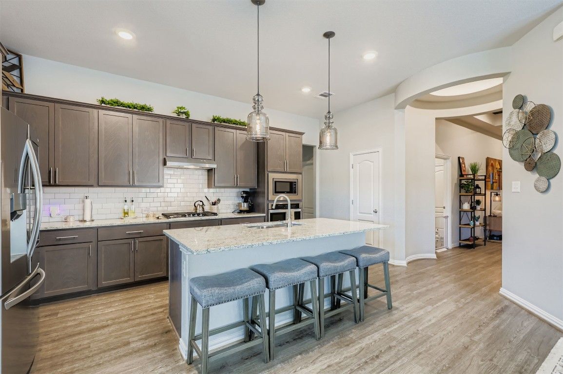 Interior, Kitchen, Pendant Lights, Recessed Lighting, Stainless Steel Appliances, Wood Texture Flooring