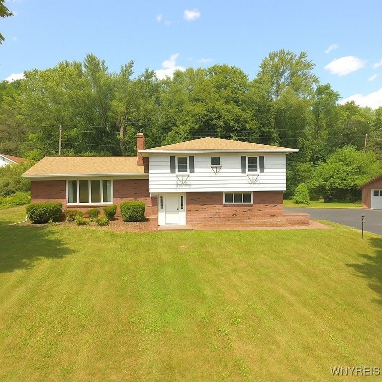 Attached, Backyard, Exterior, Facade, Brick Facade, Split Level