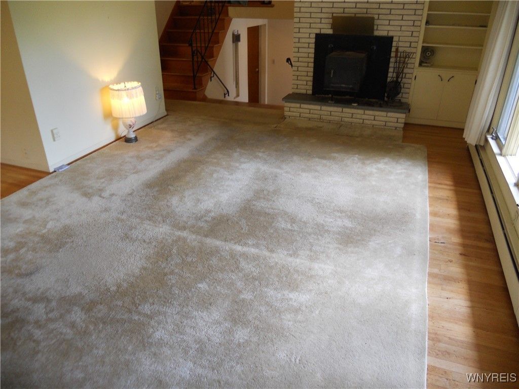 Empty room, Fireplace, Interior, Stone Walls, Wood Texture Flooring