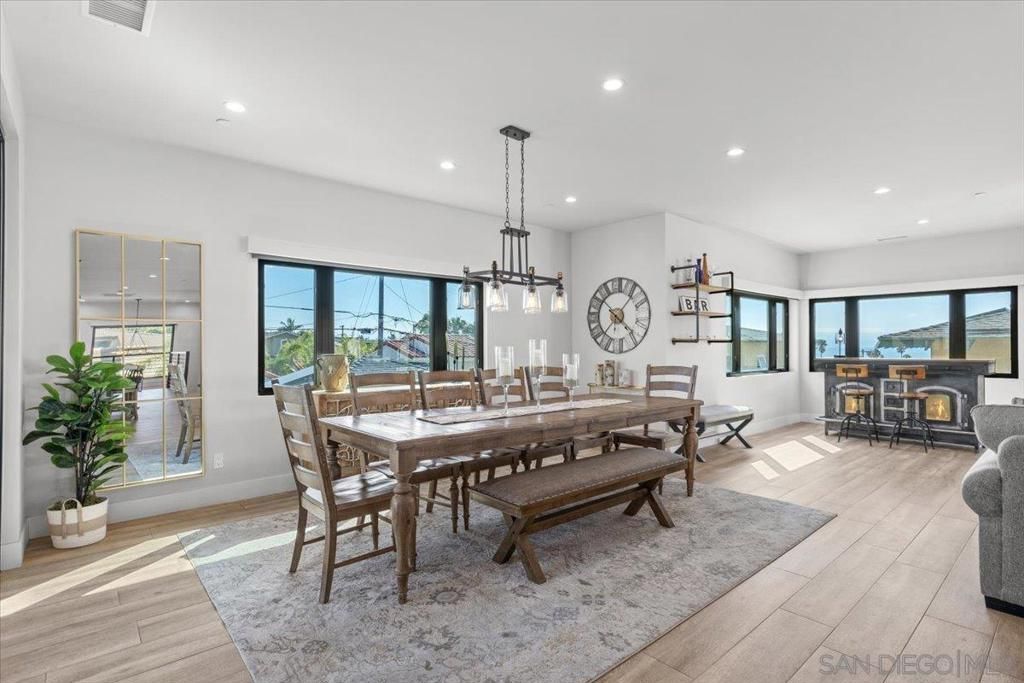 Dining room, Fireplace, Interior, Pendant Lights, Recessed Lighting, Wood Texture Flooring