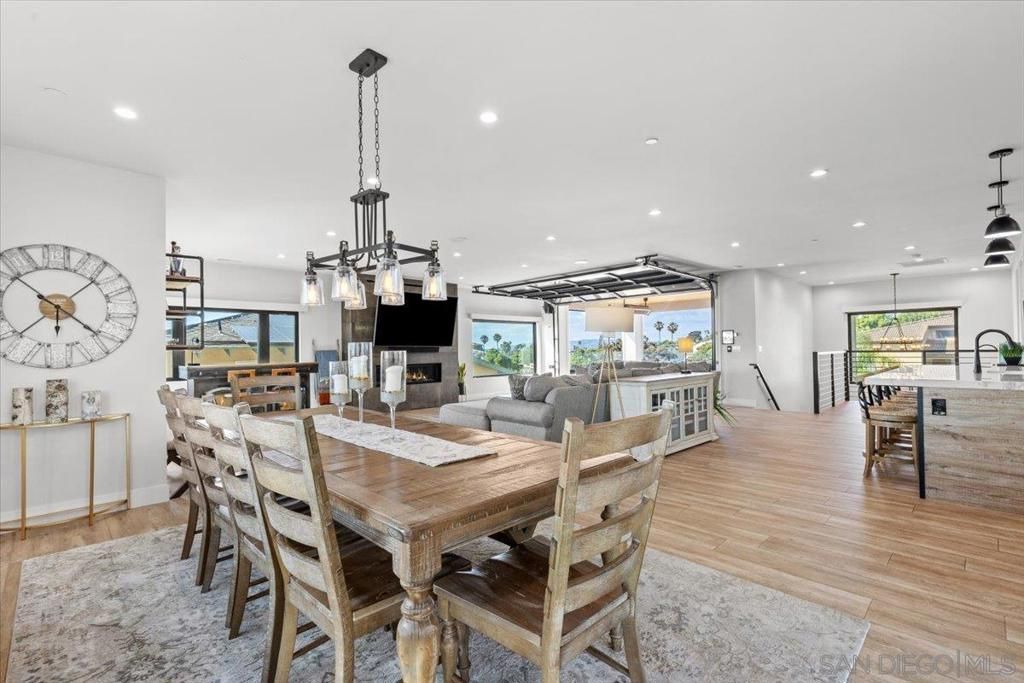 Dining room, Fireplace, Interior, Kitchen, Living room, Pendant Lights, Recessed Lighting, Water, Wood Texture Flooring