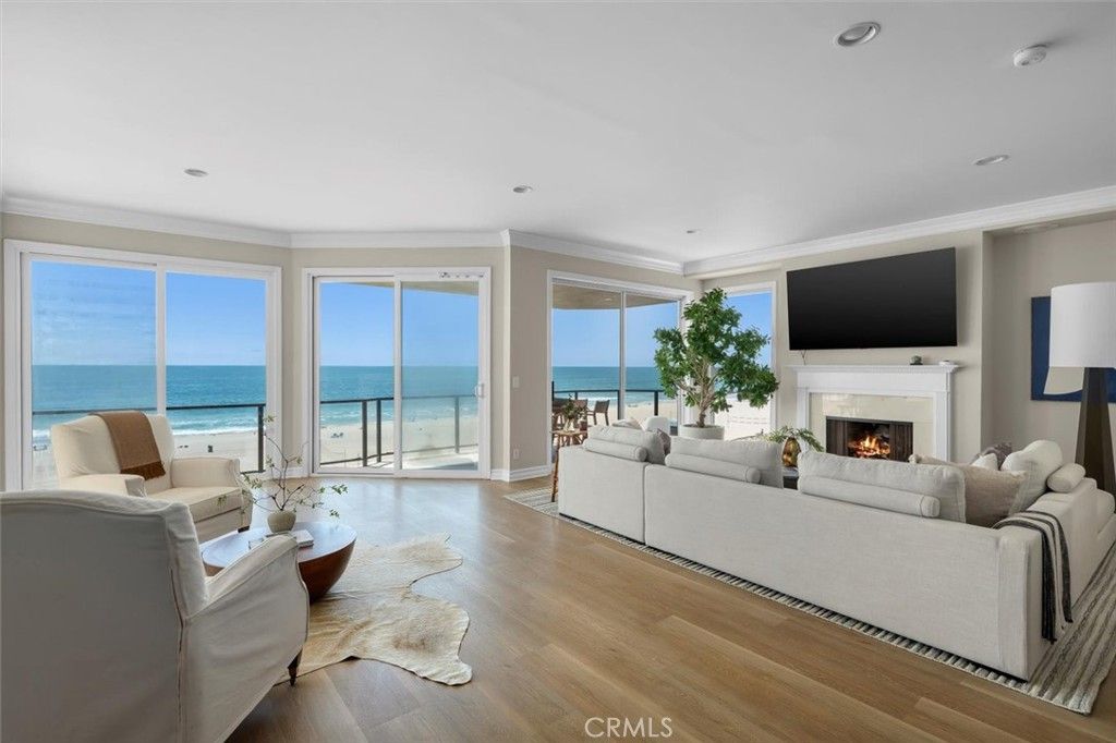 Fireplace, Interior, Living room, Recessed Lighting, Water, Wood Texture Flooring