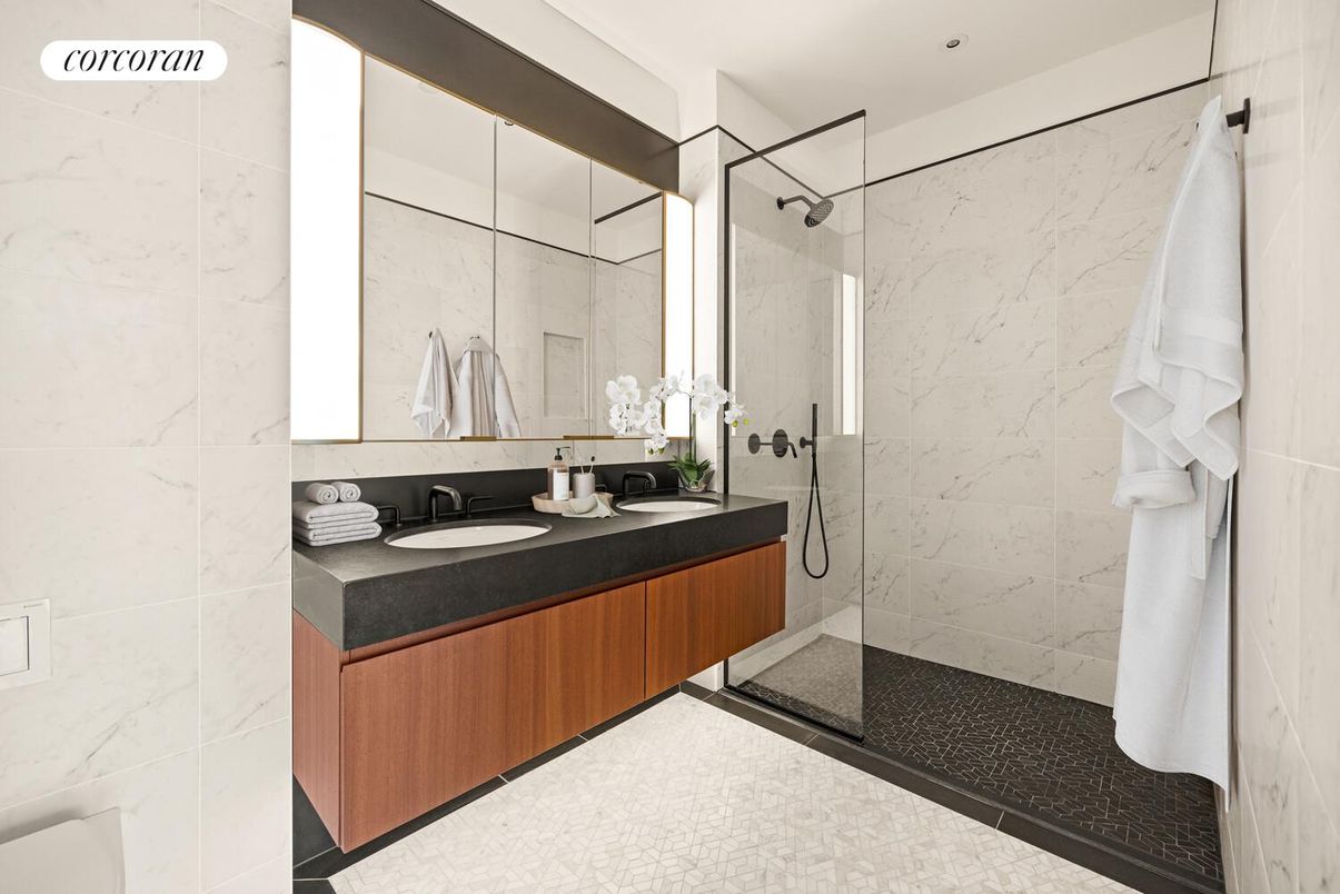 Bathroom, Dual Sink Vanities, Glass Shower, Interior, Marble Walls, Recessed Lighting