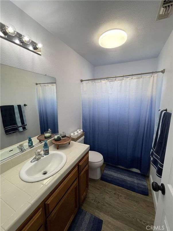 Bathroom, Dual Sink Vanities, Interior, Tile Countertops, Wood Texture Flooring