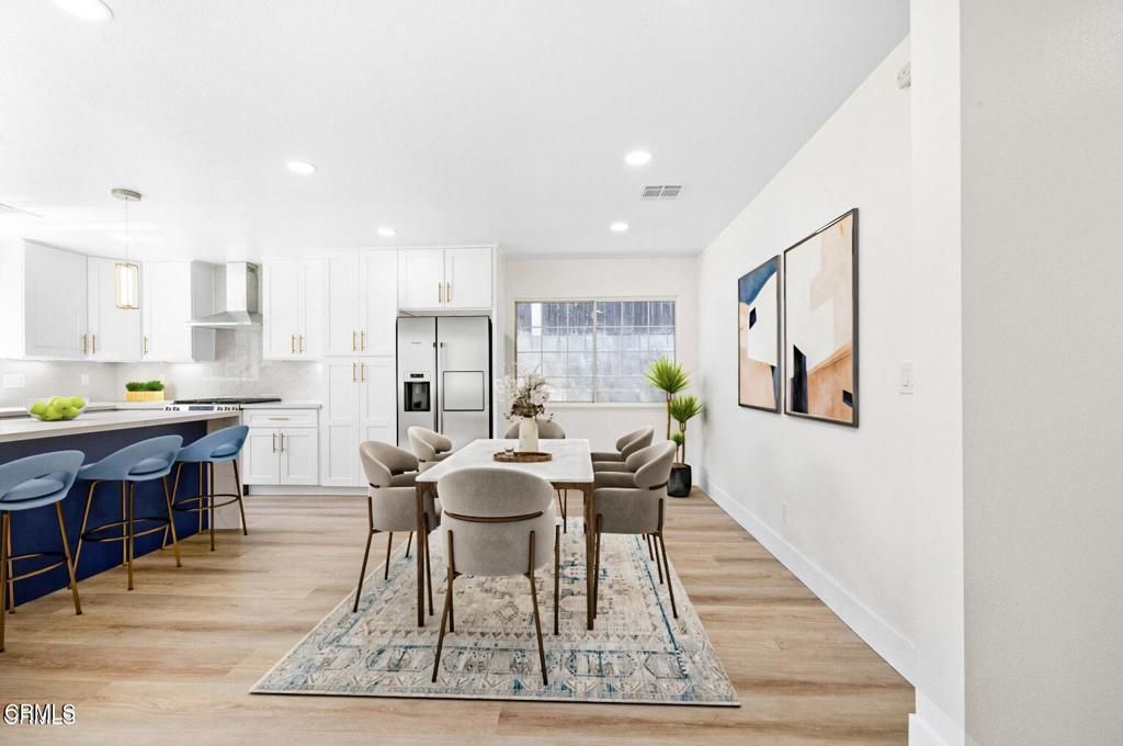 Dining room, Interior, Kitchen, Pendant Lights, Recessed Lighting, Stainless Steel Appliances, Wood Texture Flooring