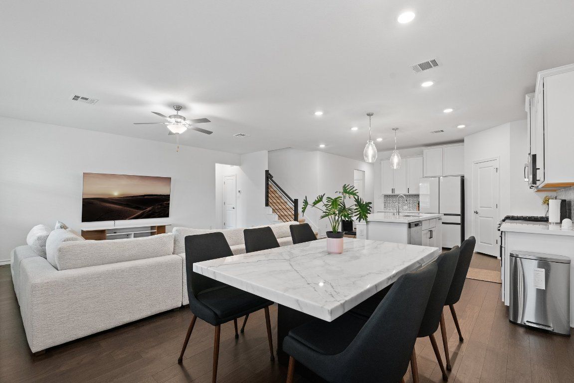 Dining room, Interior, Kitchen, Living room, Pendant Lights, Recessed Lighting, Stainless Steel Appliances, Wood Texture Flooring