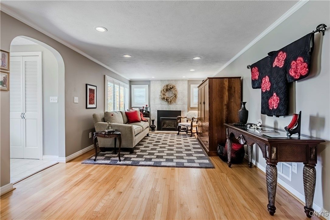 Fireplace, Interior, Living room, Recessed Lighting, Wood Texture Flooring