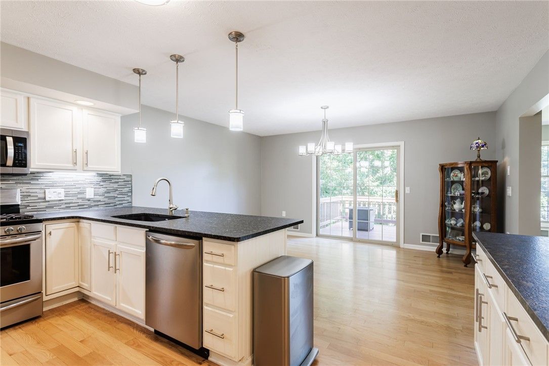 Chandelier, Interior, Kitchen, Pendant Lights, Stainless Steel Appliances, Wood Texture Flooring