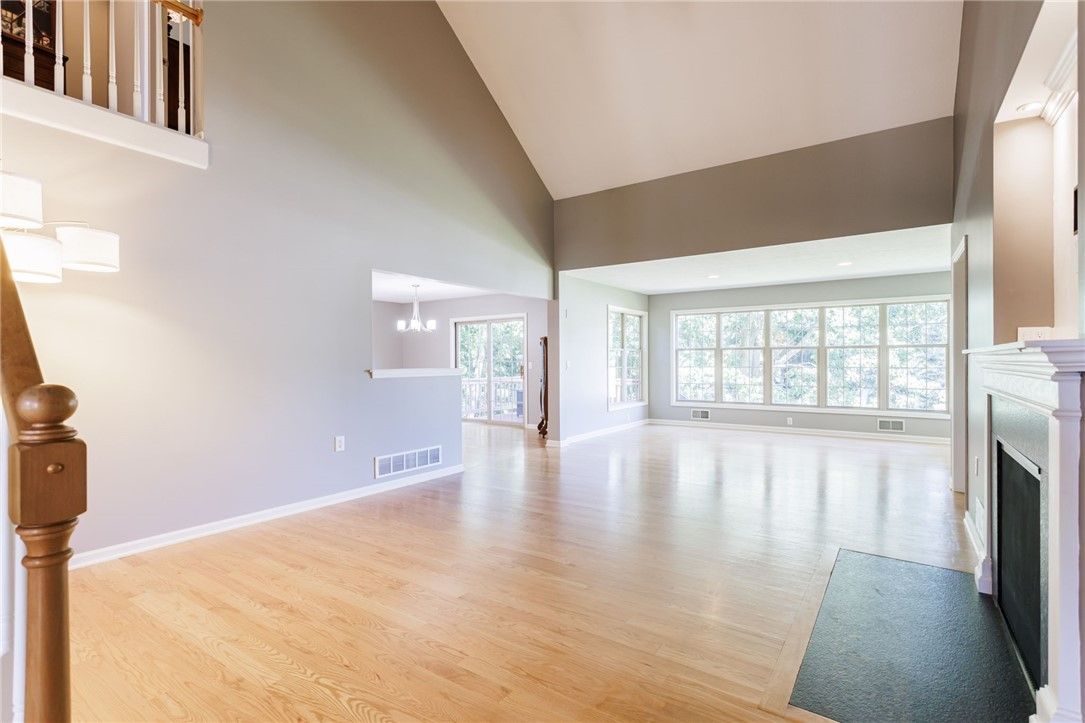 Empty room, Fireplace, Interior, Pendant Lights, Recessed Lighting, Wood Texture Flooring