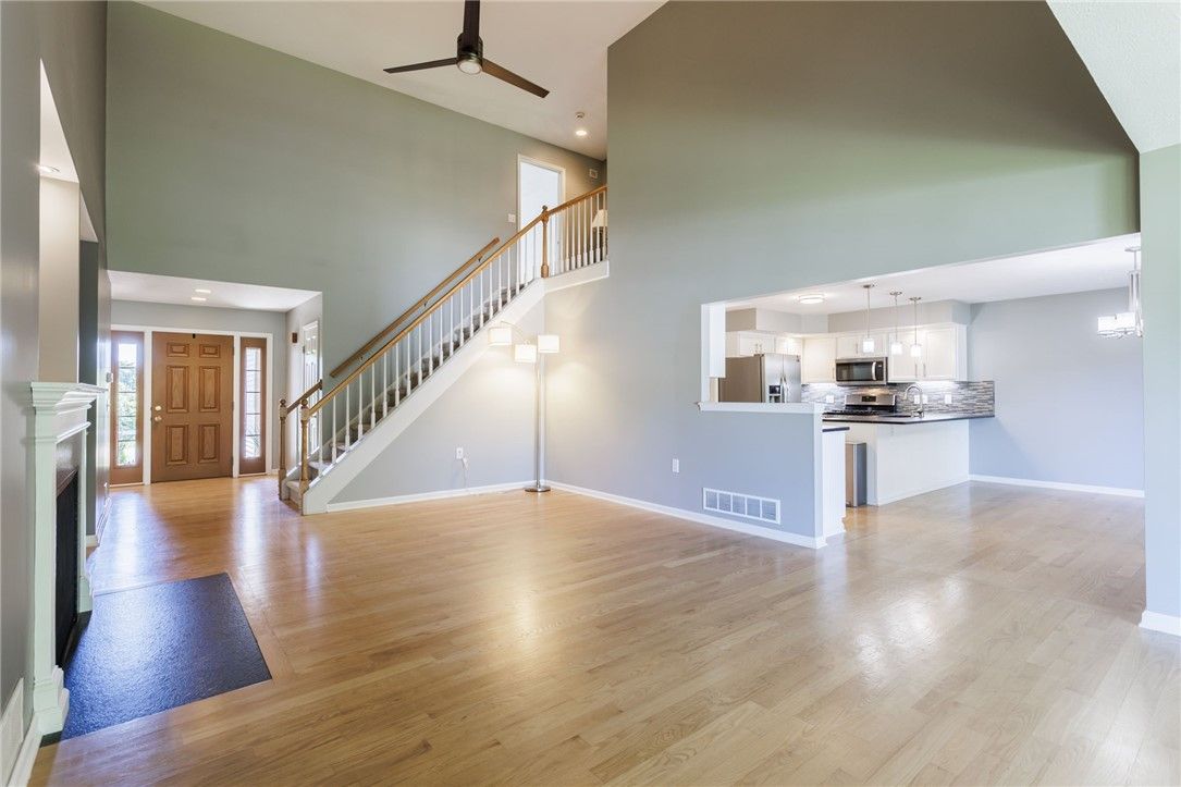 Chandelier, Interior, Kitchen, Pendant Lights, Recessed Lighting, Stainless Steel Appliances, Wood Texture Flooring