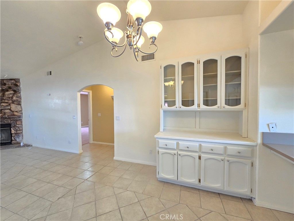 Chandelier, Empty room, Fireplace, Interior