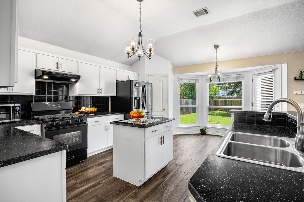 Chandelier, Interior, Kitchen, Pendant Lights, Stainless Steel Appliances, Wood Texture Flooring