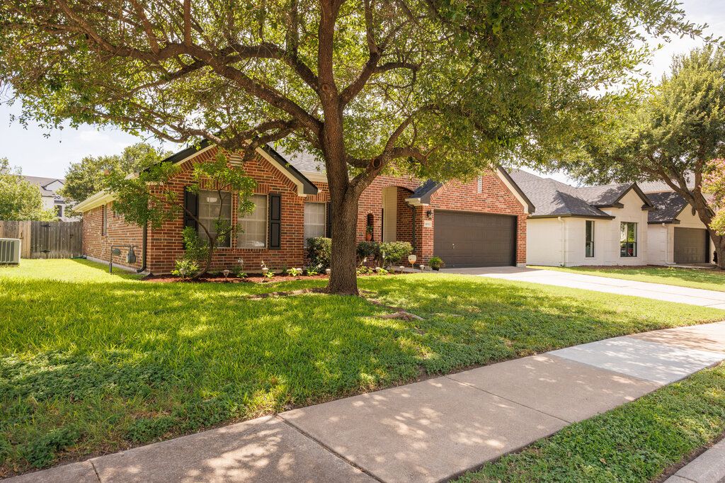 Attached, Backyard, Exterior, Facade, Brick Facade, Tudor Revival