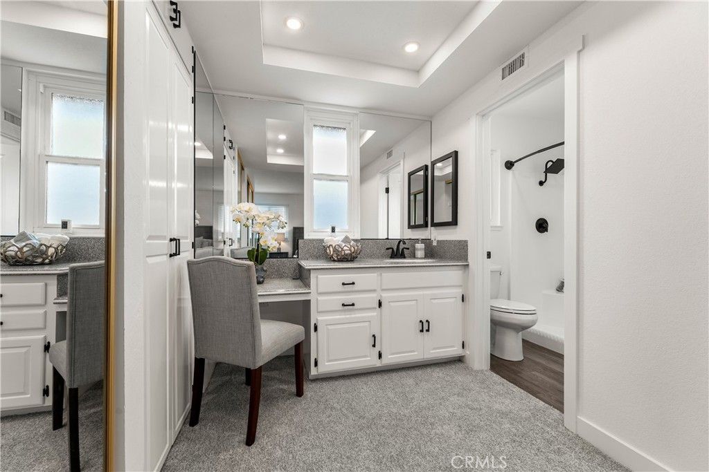 Bathroom, Dual Sink Vanities, Interior, Recessed Lighting, Wood Texture Flooring