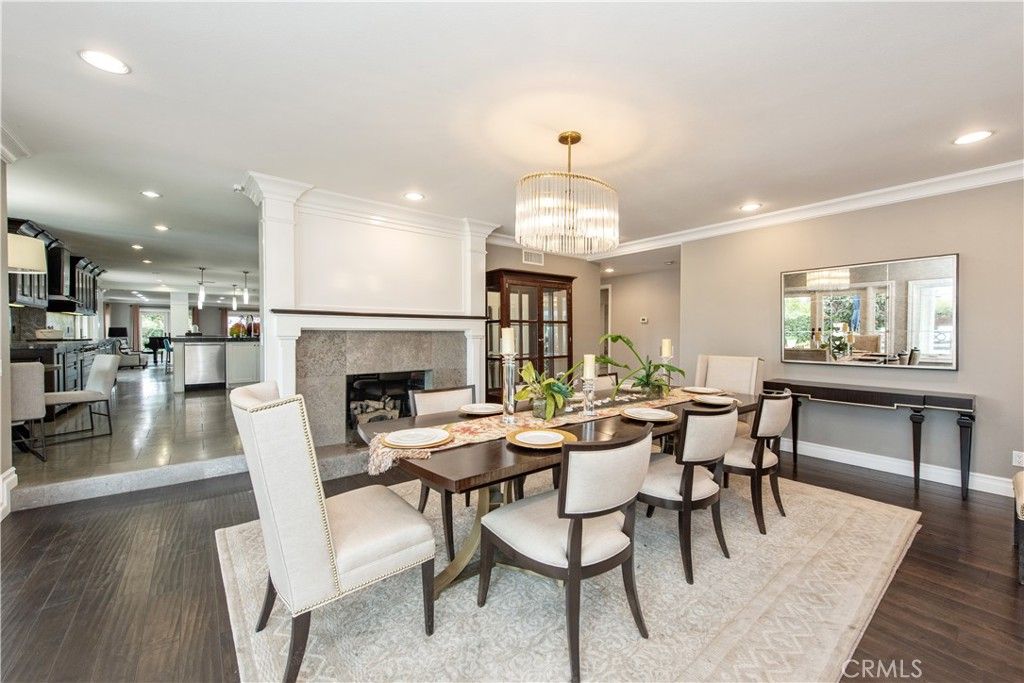 Chandelier, Dining room, Fireplace, Interior, Kitchen, Recessed Lighting, Wood Texture Flooring