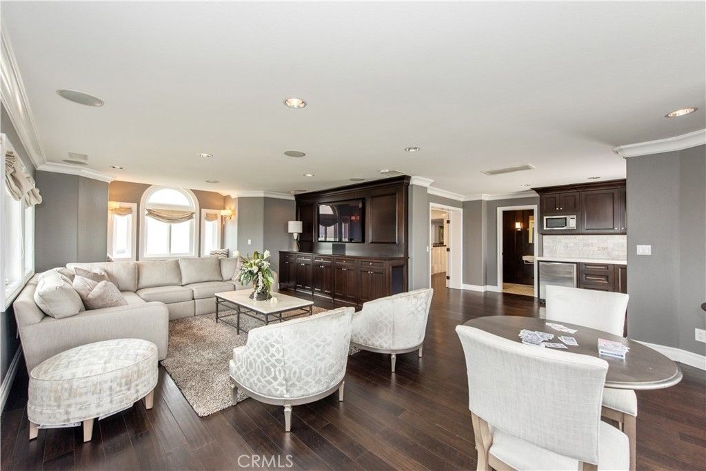 Dining room, Interior, Kitchen, Living room, Recessed Lighting, Stainless Steel Appliances, Wood Texture Flooring