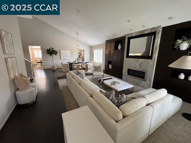 Dining room, Fireplace, Interior, Living room, Pendant Lights, Recessed Lighting, Wood Texture Flooring