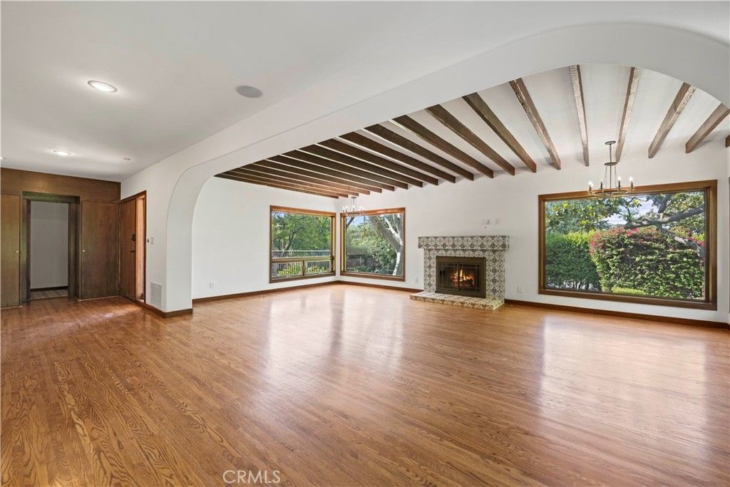 Empty room, Fireplace, Interior, Pendant Lights, Recessed Lighting, Wooden Beams, Wood Texture Flooring