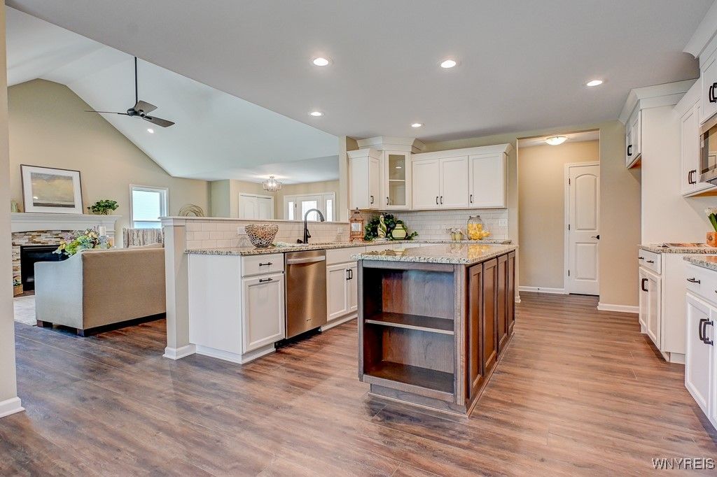 Fireplace, Interior, Kitchen, Living room, Recessed Lighting, Stainless Steel Appliances, Wood Texture Flooring