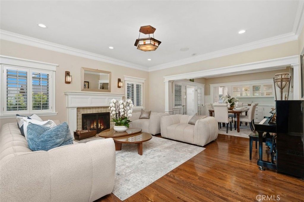 Dining room, Fireplace, Interior, Living room, Recessed Lighting, Wood Texture Flooring