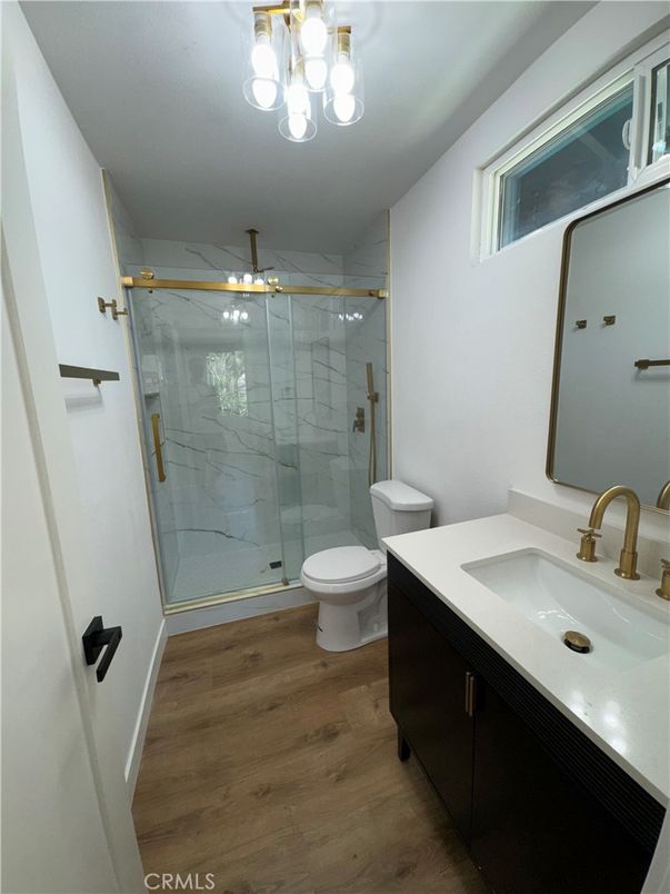 Bathroom, Glass Shower, Interior, Marble Walls, Wood Texture Flooring