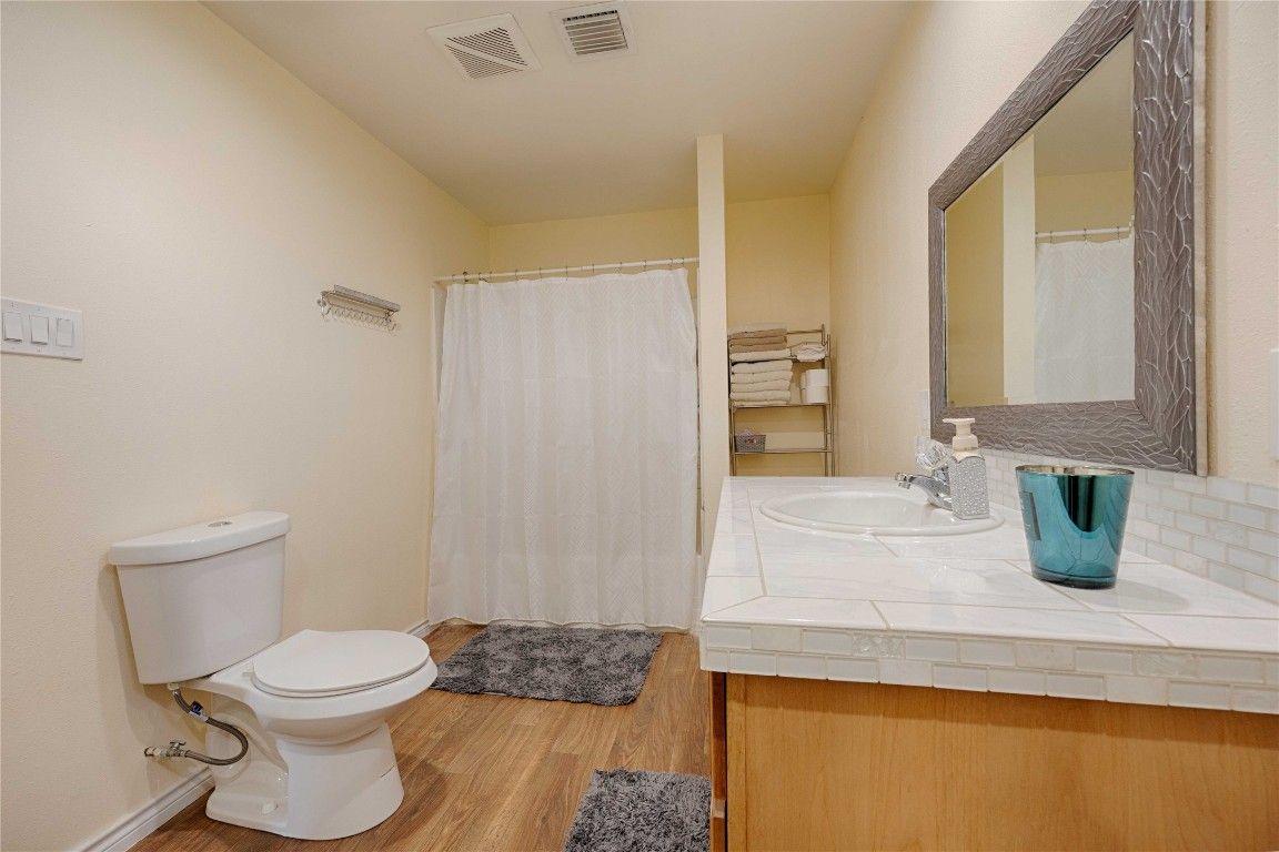 Bathroom, Interior, Tile Countertops, Wood Texture Flooring
