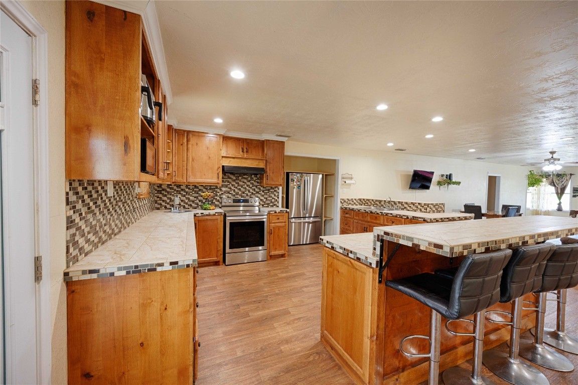 Interior, Kitchen, Recessed Lighting, Stainless Steel Appliances, Wood Texture Flooring