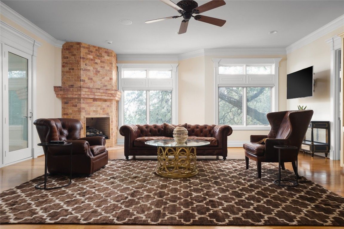 Fireplace, Interior, Living room, Recessed Lighting, Stone Walls, Wood Texture Flooring