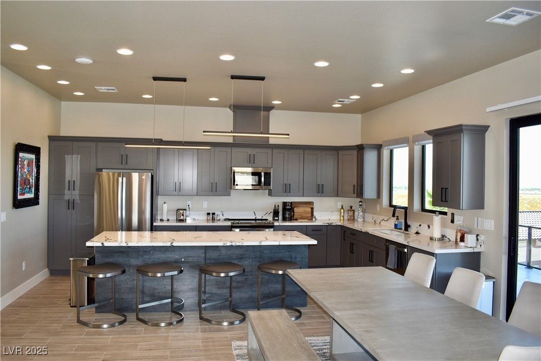Interior, Kitchen, Pendant Lights, Recessed Lighting, Stainless Steel Appliances, Wood Texture Flooring