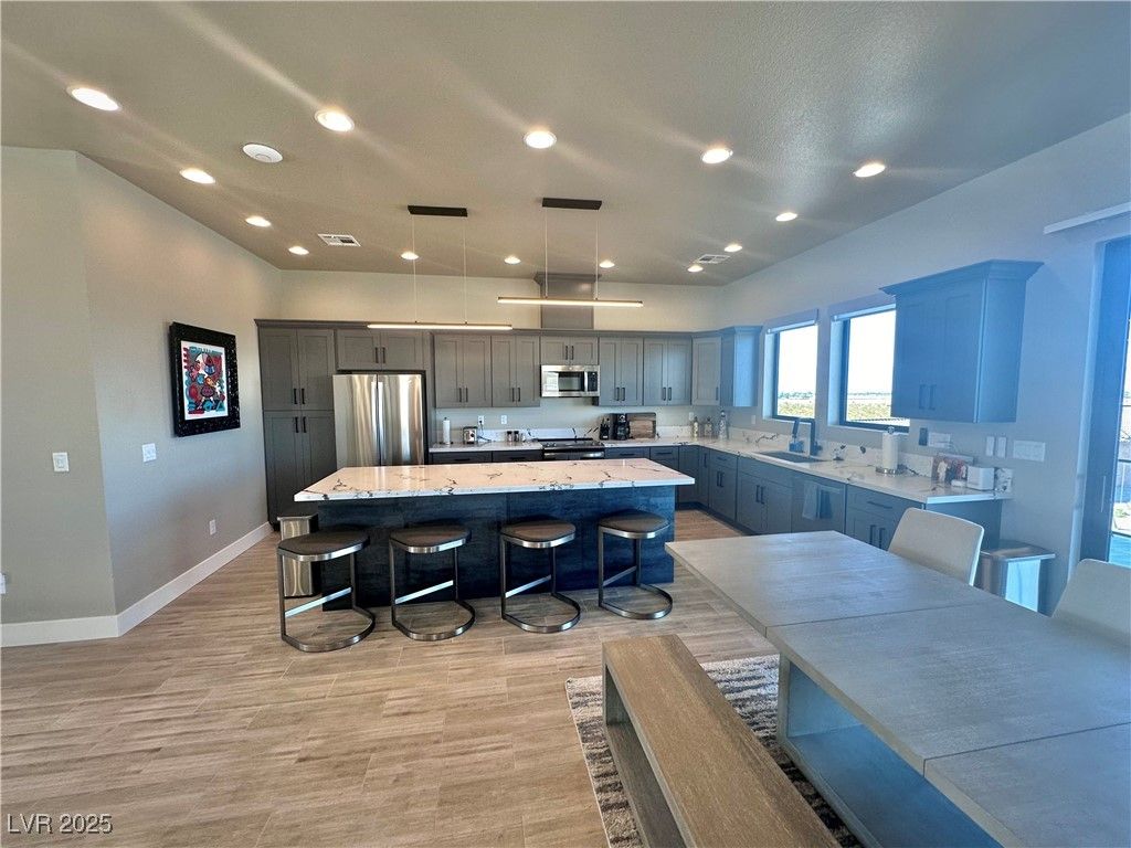 Interior, Kitchen, Pendant Lights, Recessed Lighting, Stainless Steel Appliances, Wood Texture Flooring