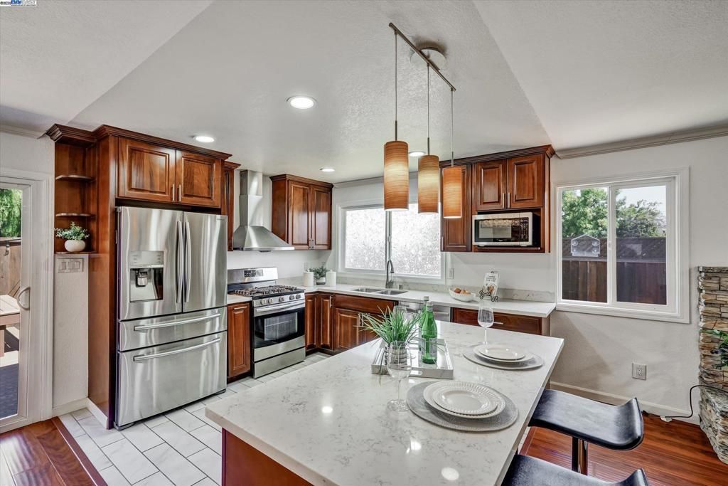 Interior, Kitchen, Pendant Lights, Recessed Lighting, Stainless Steel Appliances, Wood Texture Flooring