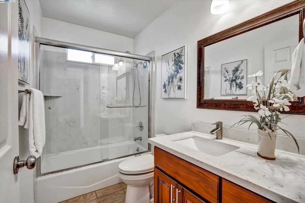 Bathroom, Glass Shower, Interior, Marble Walls, Wood Texture Flooring