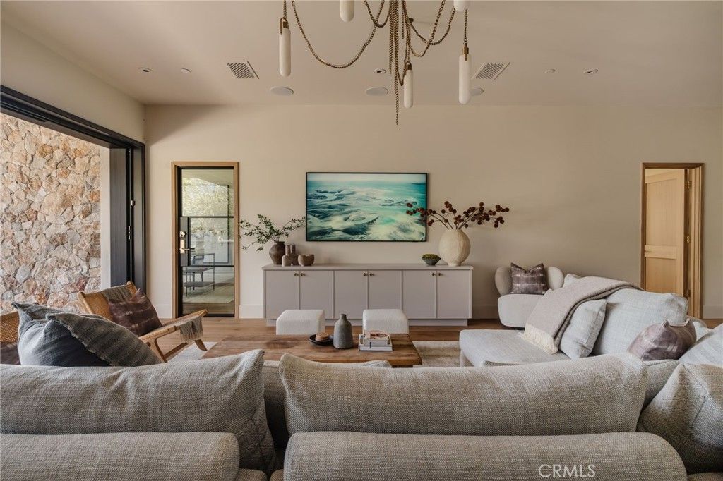 Chandelier, Interior, Living room, Recessed Lighting, Stone Walls, Wood Texture Flooring
