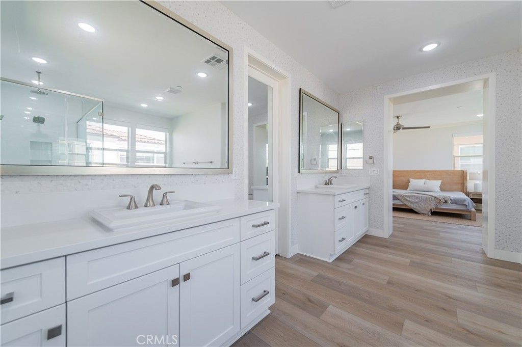 Bathroom, Bedroom, Dual Sink Vanities, Glass Shower, Interior, Recessed Lighting, Wood Texture Flooring