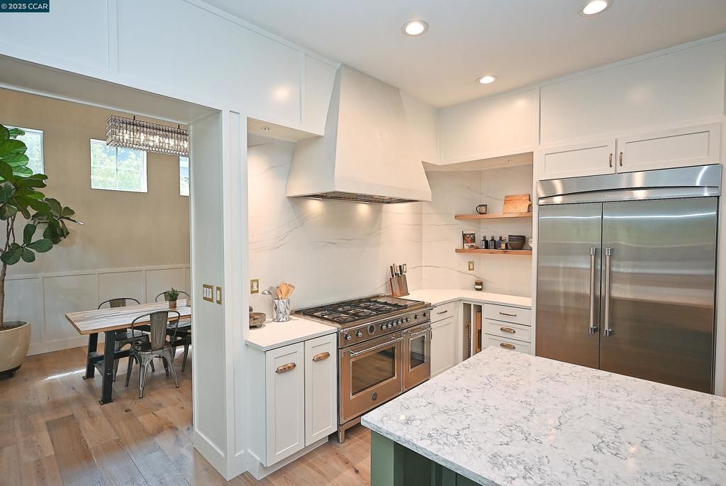 Dining room, Interior, Kitchen, Recessed Lighting, Stainless Steel Appliances, Wood Texture Flooring