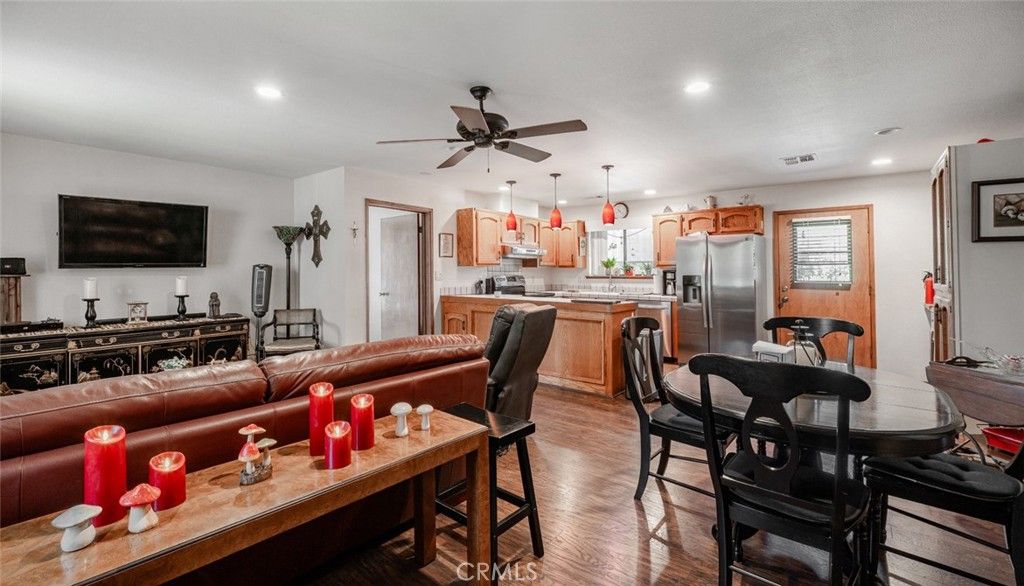 Dining room, Interior, Kitchen, Pendant Lights, Recessed Lighting, Stainless Steel Appliances, Wood Texture Flooring