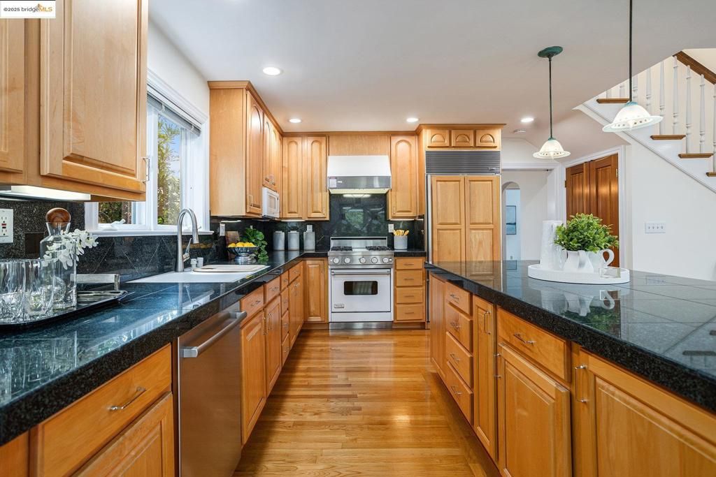 Interior, Kitchen, Pendant Lights, Recessed Lighting, Stainless Steel Appliances, Wood Texture Flooring