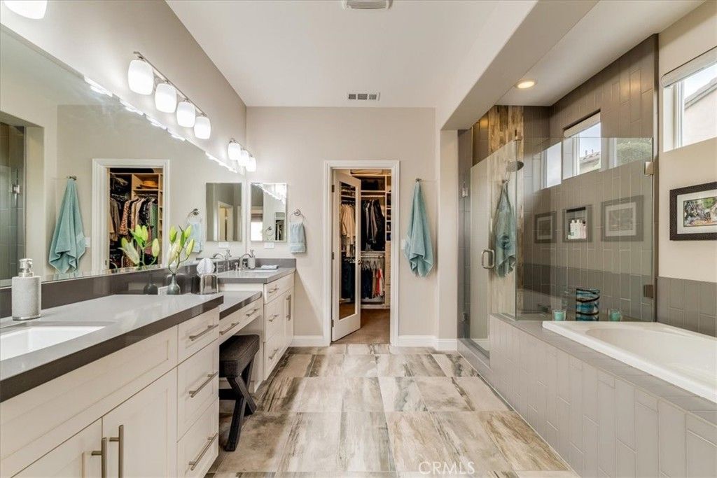 Bathroom, Dual Sink Vanities, Glass Shower, Interior, Recessed Lighting, Walk-in Closets, Wood Texture Flooring