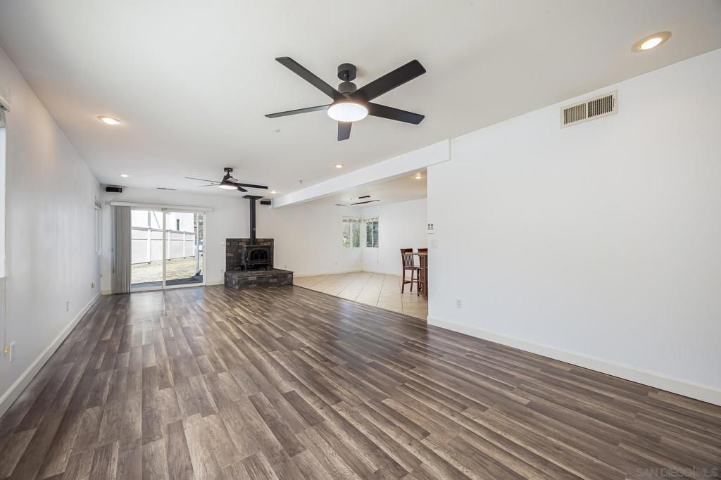 Empty room, Fireplace, Interior, Recessed Lighting, Wood Texture Flooring