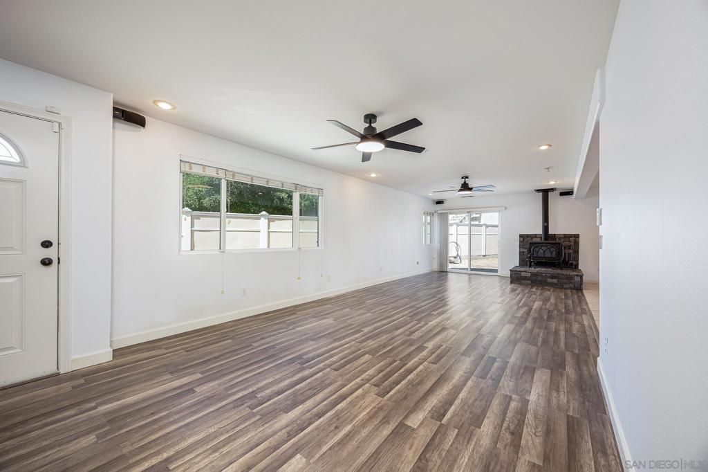 Empty room, Fireplace, Interior, Recessed Lighting, Wood Texture Flooring