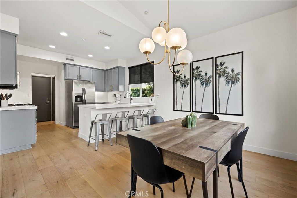 Dining room, Interior, Kitchen, Pendant Lights, Recessed Lighting, Stainless Steel Appliances, Wood Texture Flooring